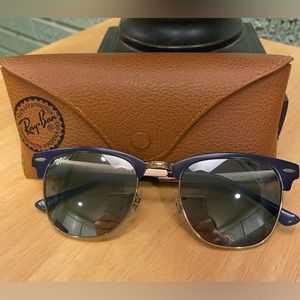 Navy Clubmaster Ray Bans with navy/gold temples, gold bridge, & blue/grey lenses